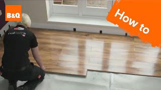 How to lay flooring part 3 laying locking laminate [upl. by Syverson]