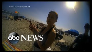 Police release bodycam video capturing womans violent beach arrest [upl. by Ainaj808]